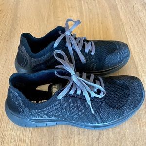 Nike free women’s shoes. Color black/grey. Size 7.
